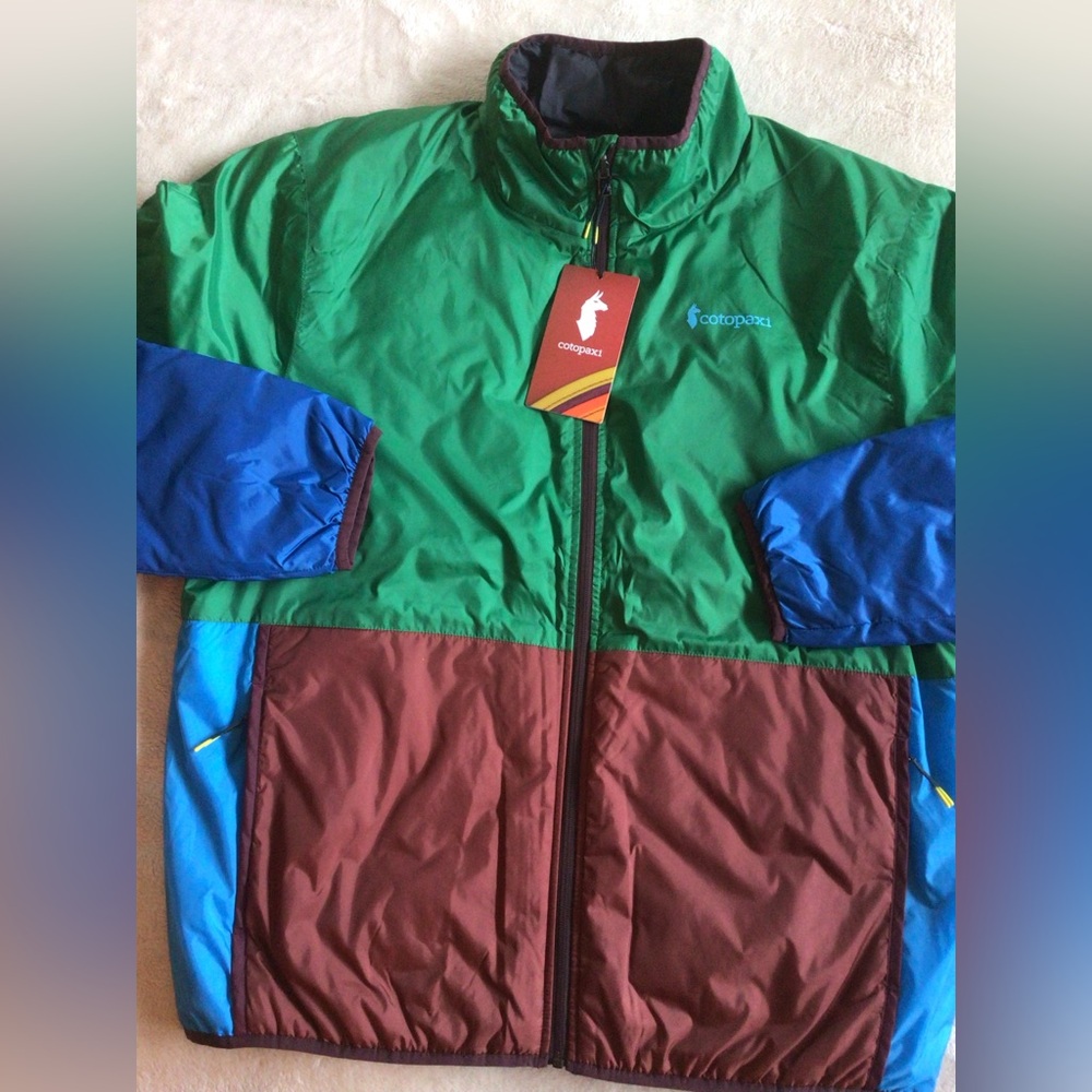 Cotopaxi Vibrant Multi color Paneled Reversible Jacket